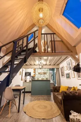 Coin salon dans l'établissement Le Puits Jaune - Gîte Nature et Spa