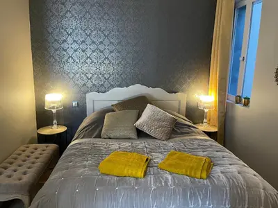 Un ou plusieurs lits dans un hébergement de l'établissement L'Hotel particulier Villequier