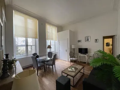 Télévision ou salle de divertissement dans l'établissement L'Hotel particulier Villequier