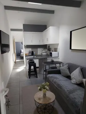 Cuisine ou kitchenette dans l'établissement Maison annexe une chambre proche Paris