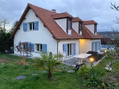 Jardin de l'établissement Chambre meublée dans une maison