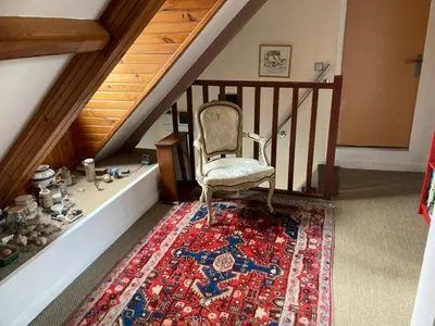 Un ou plusieurs lits dans un hébergement de l'établissement Chambre meublée dans une maison