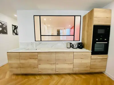 Cuisine ou kitchenette dans l'établissement L’intemporel