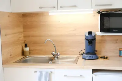 Cuisine ou kitchenette dans l'établissement Le petit Val