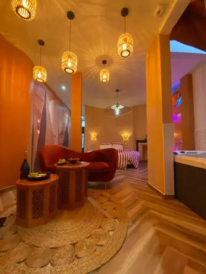 Coin salon dans l'établissement L'enveloppe Romantique