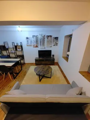 Coin salon dans l'établissement Cosy Triplex 3 chambres