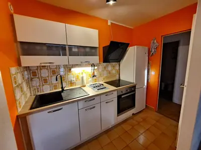 Cuisine ou kitchenette dans l'établissement Sous les Etoiles - dans le plus haut gratte-ciel avec parking en sus