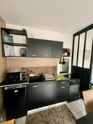 Cuisine ou kitchenette dans l'établissement La Romance