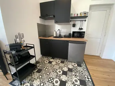 Cuisine ou kitchenette dans l'établissement Brown Cosy Loft Centre