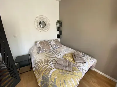 Un ou plusieurs lits dans un hébergement de l'établissement Brown Cosy Loft Centre